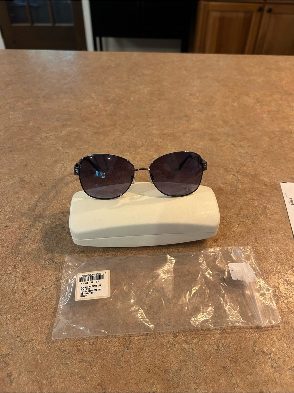 Ann Klein Classic Women’s Dark Purple Lens Sunglasses